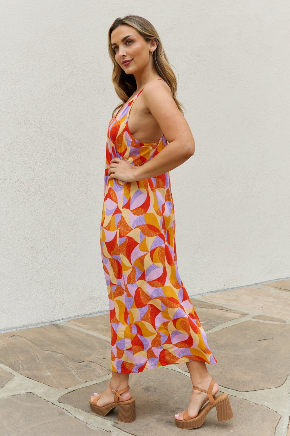 Turn Heads in Our Stunning Backless Maxi Dress with Criss Cross back