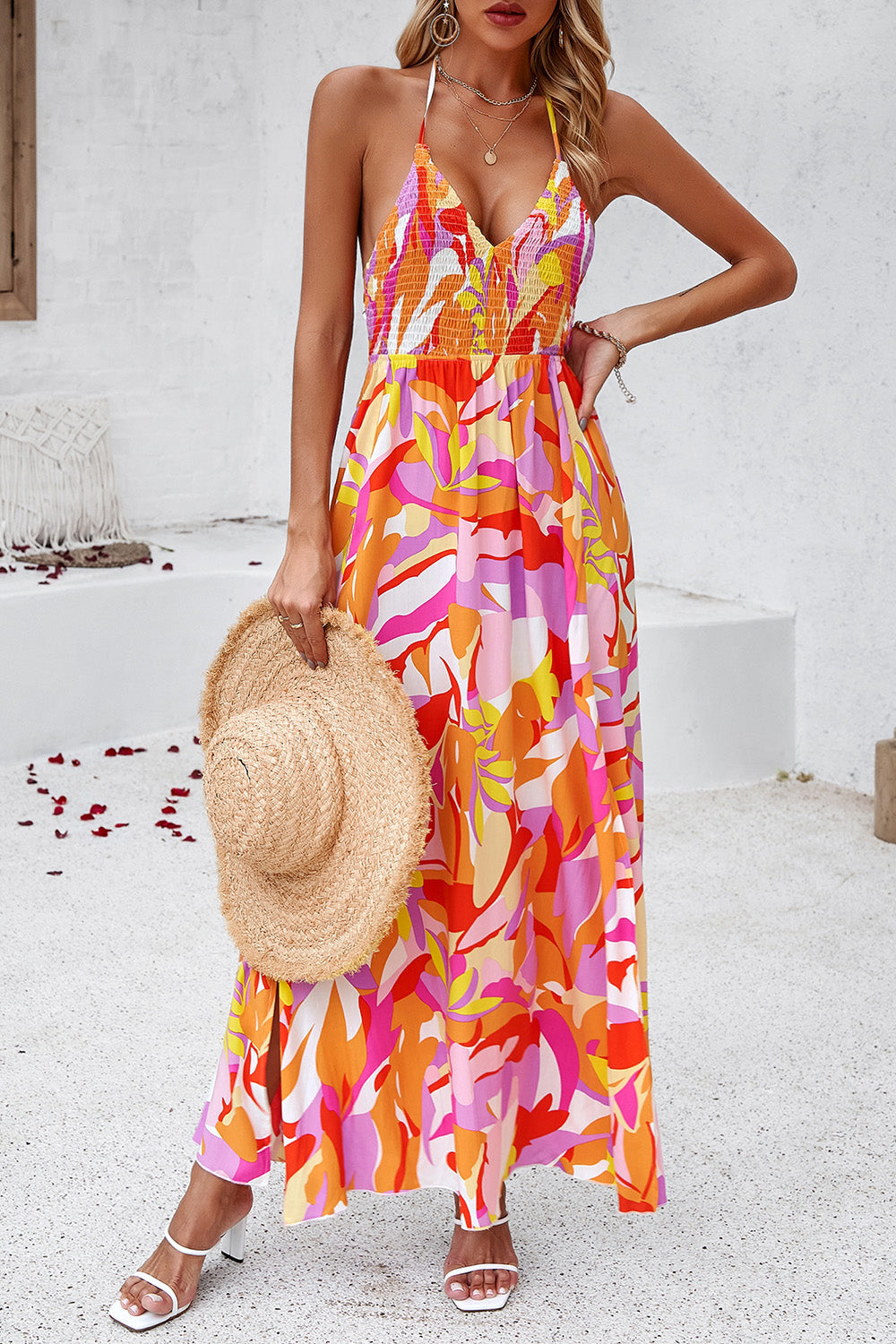 Indulge in feminine allure with our Smocked Slit Tied Printed Dress. Delicate smocked bodice, alluring front slit, and vibrant summer-inspired print make it perfect for any occasion. Shop now and embrace effortless femininity! Summer Dresses