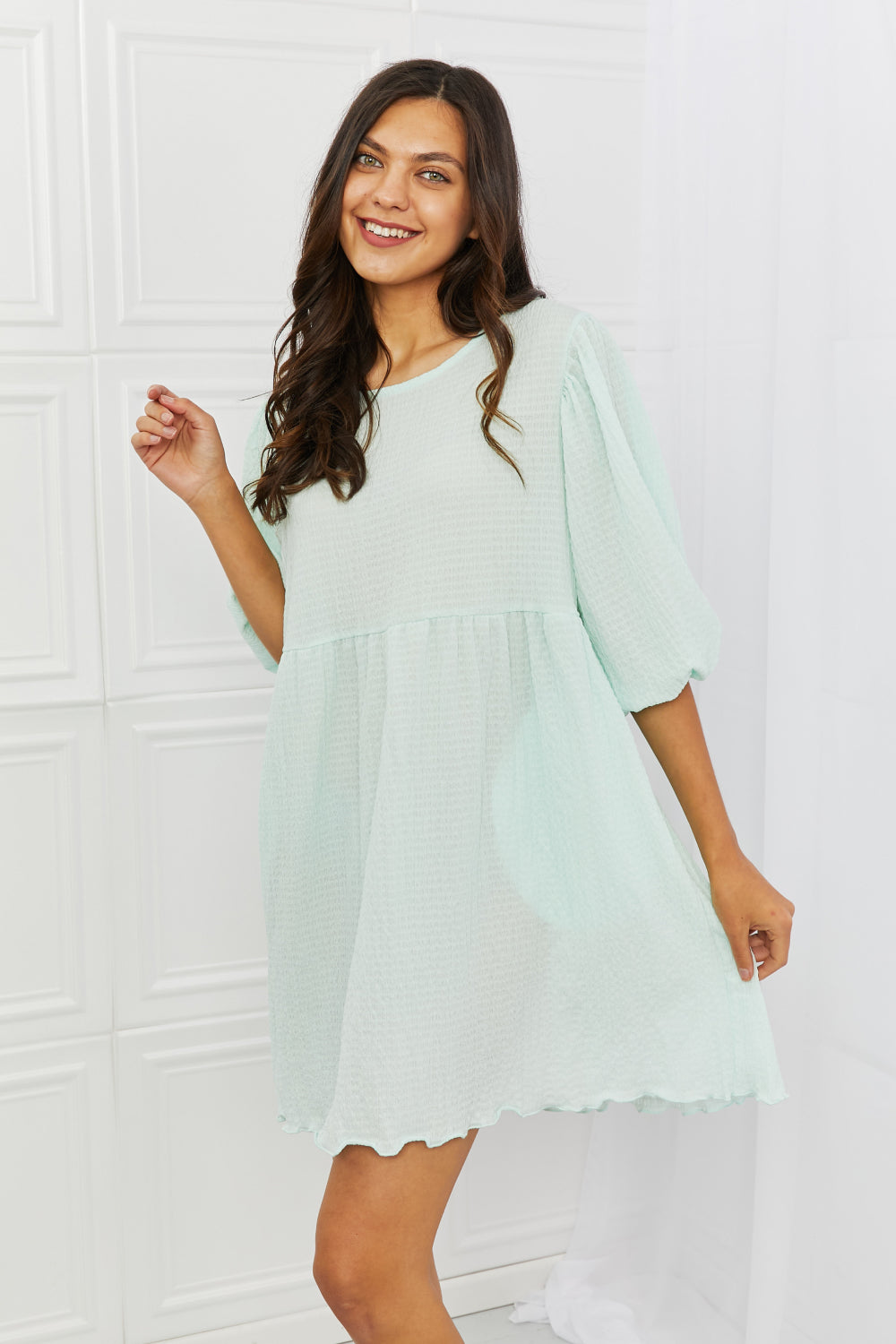 Puff Sleeve Elasticized Dress - A charming dress with playful puff sleeves and versatile styling options for both casual and dressy occasions.