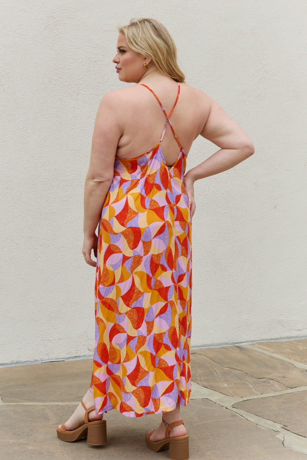 Turn Heads in Our Stunning Backless Maxi Dress with Criss Cross back