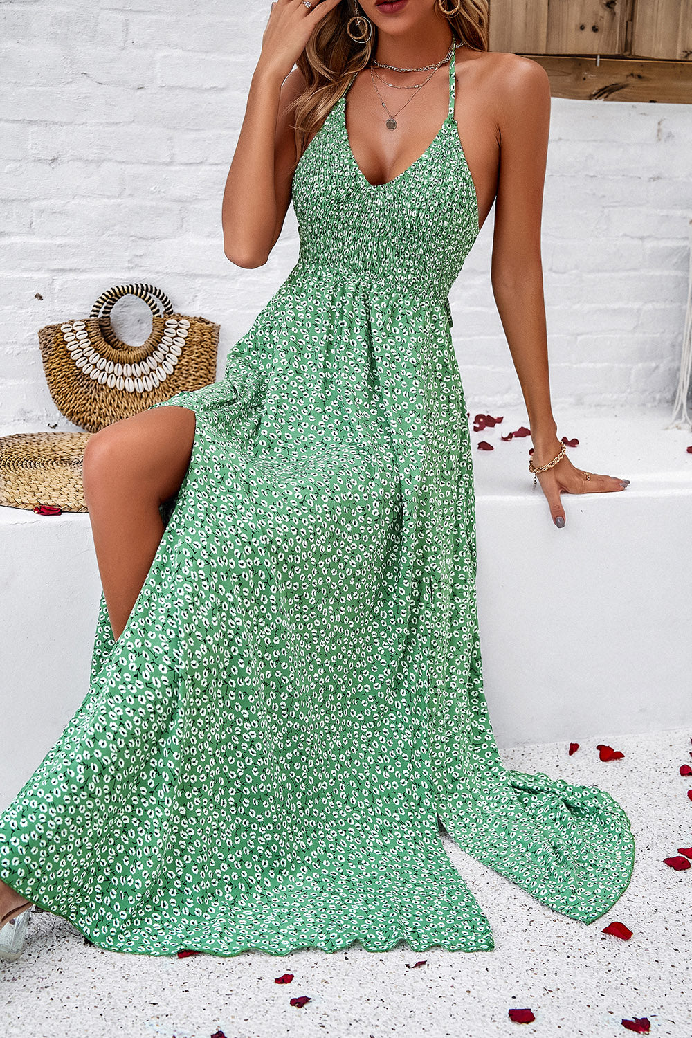 Indulge in feminine allure with our Smocked Slit Tied Printed Dress. Delicate smocked bodice, alluring front slit, and vibrant summer-inspired print make it perfect for any occasion. Shop now and embrace effortless femininity! Summer Dresses