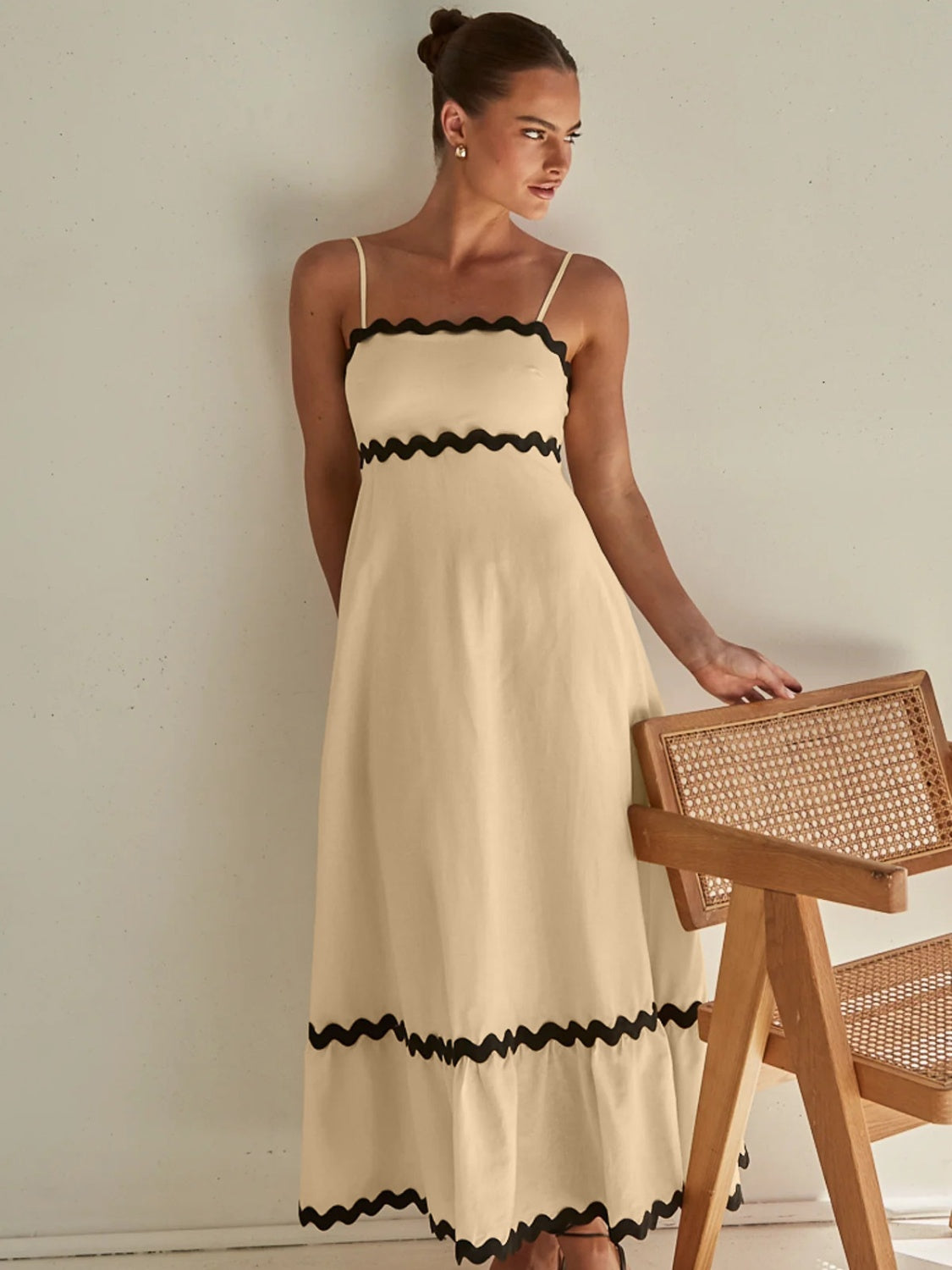 Discover chic summer style with our Spaghetti Strap Maxi Dress. Made from lightweight fabric for breathable comfort, this dress offers effortless elegance and flowy femininity. Perfect for any occasion, from beach days to brunch dates. Shop now for versatile summer style!