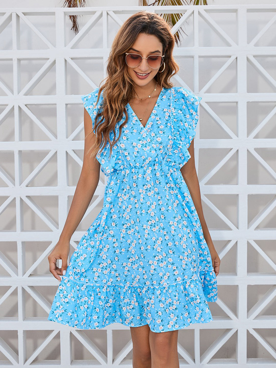 Blossom in Style: Ruffled Ditsy Floral Surplice Mini Dress