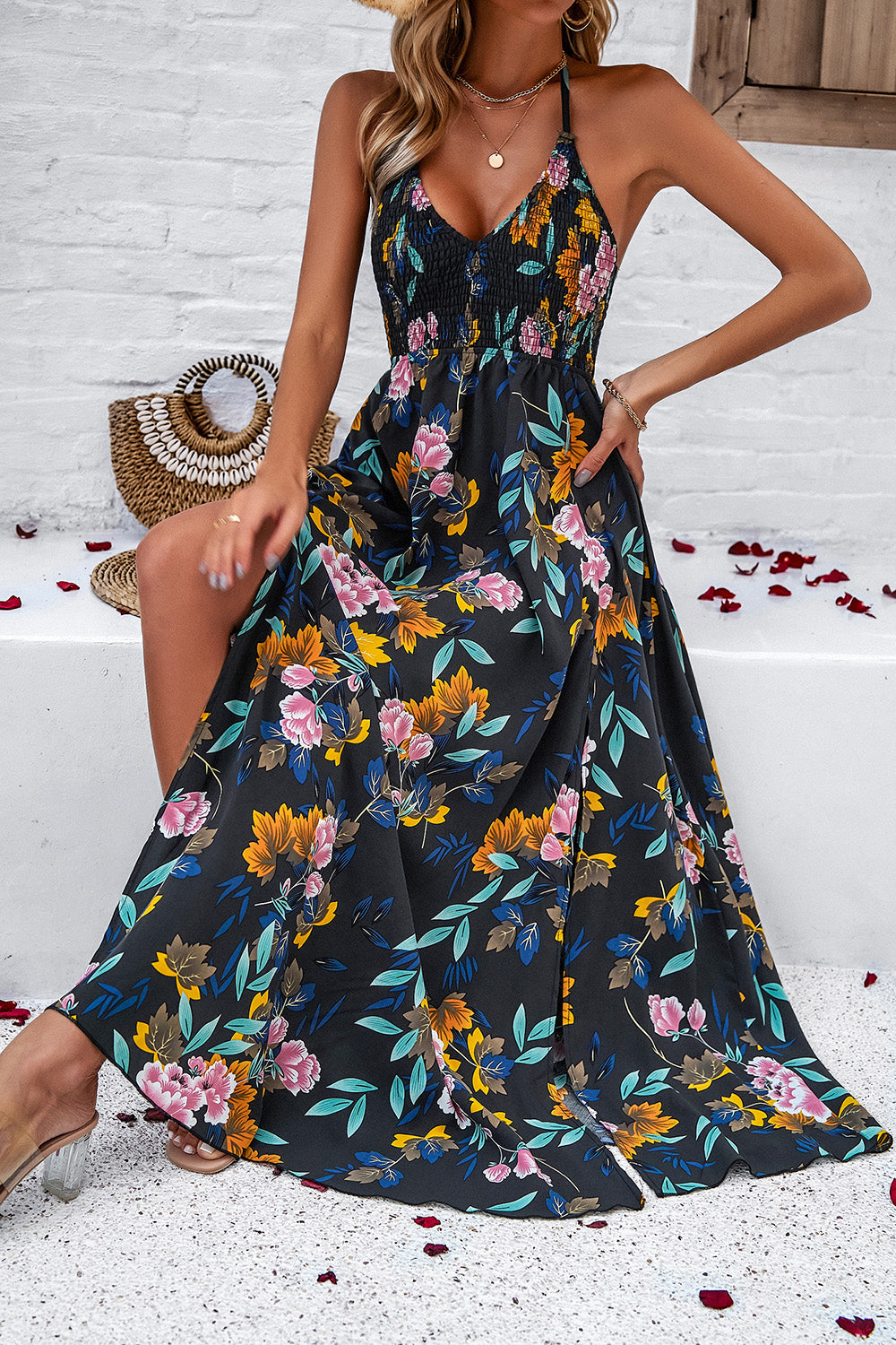 Indulge in feminine allure with our Smocked Slit Tied Printed Dress. Delicate smocked bodice, alluring front slit, and vibrant summer-inspired print make it perfect for any occasion. Shop now and embrace effortless femininity! Summer Dresses