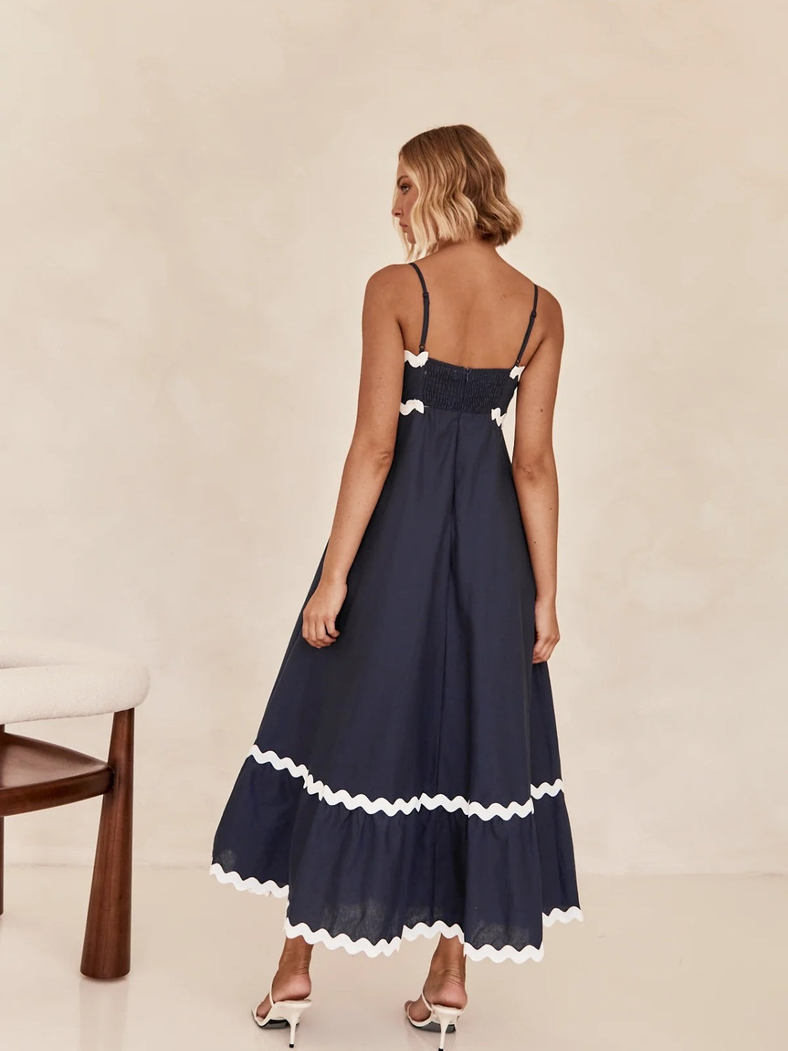 Discover chic summer style with our Spaghetti Strap Maxi Dress. Made from lightweight fabric for breathable comfort, this dress offers effortless elegance and flowy femininity. Perfect for any occasion, from beach days to brunch dates. Shop now for versatile summer style!