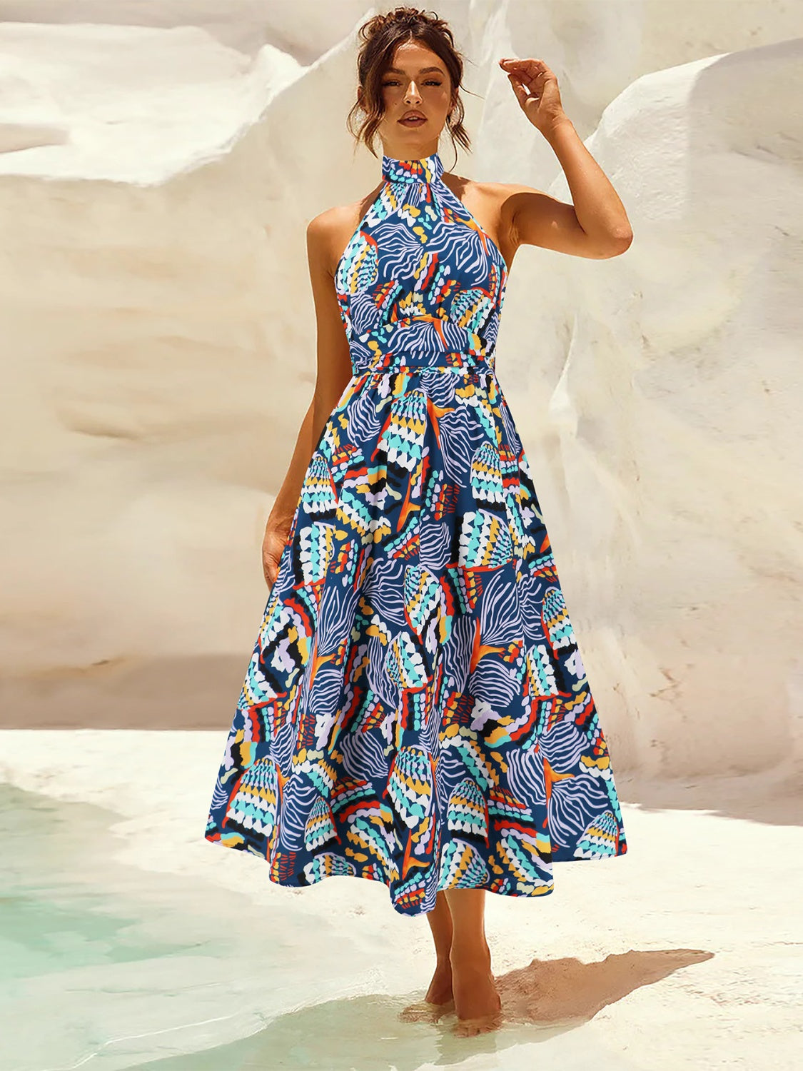 Unleash Your Inner Glam with the Ruched Printed Halter Neck Sleeveless Dress