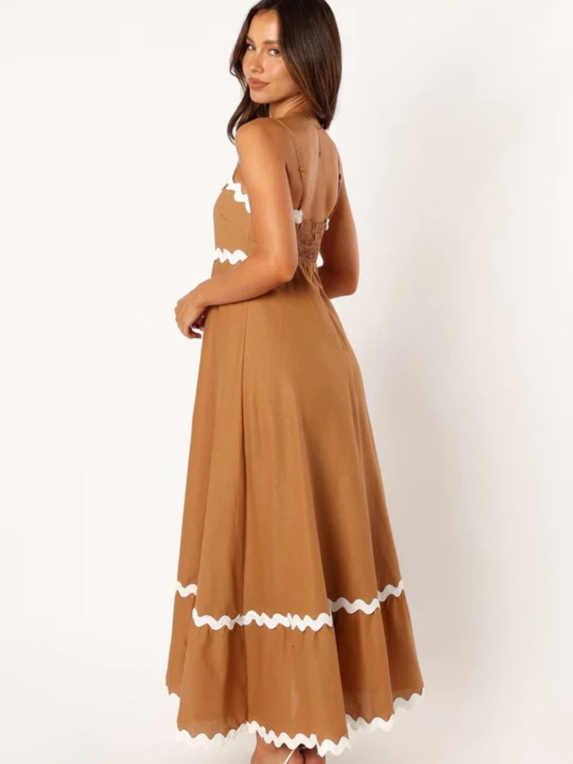 Discover chic summer style with our Spaghetti Strap Maxi Dress. Made from lightweight fabric for breathable comfort, this dress offers effortless elegance and flowy femininity. Perfect for any occasion, from beach days to brunch dates. Shop now for versatile summer style!