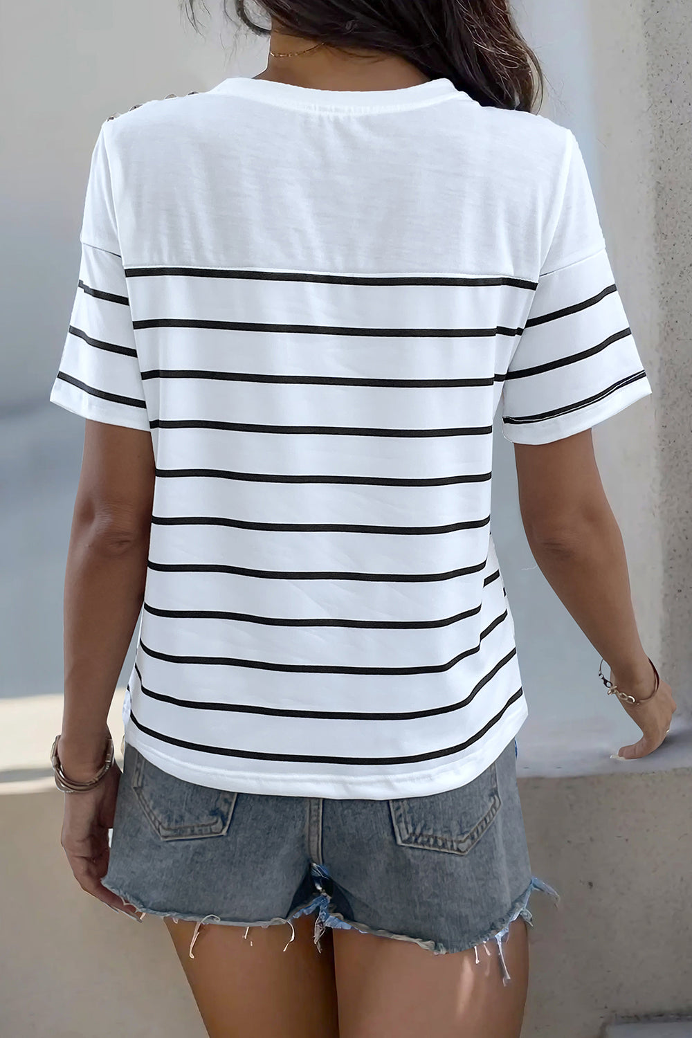 Decorative Button Striped Short Sleeve T-Shirt - Front View: Make a statement with our trendy striped tee featuring decorative buttons.