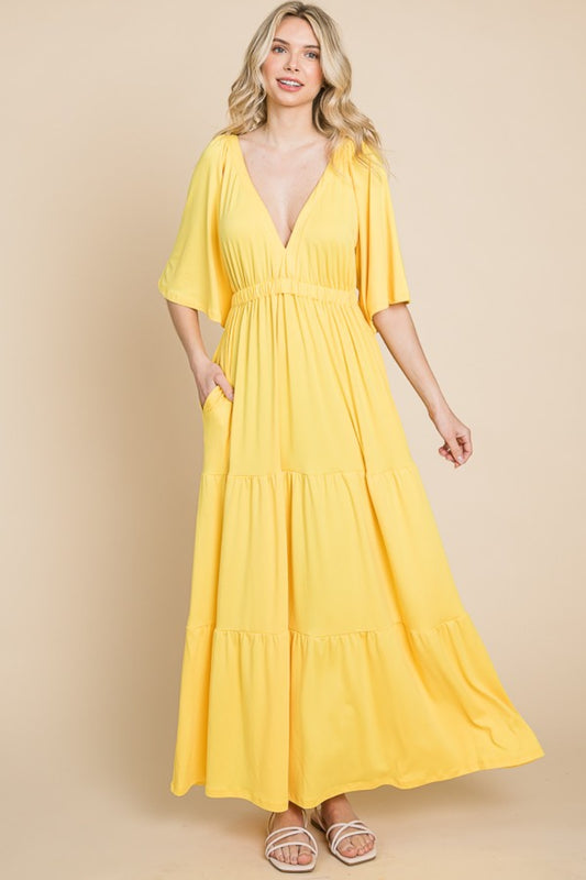 Backless Plunge Half Sleeve Tiered Dress - A stunning dress with a backless design, plunging neckline, and tiered skirt for an elegant and feminine look.