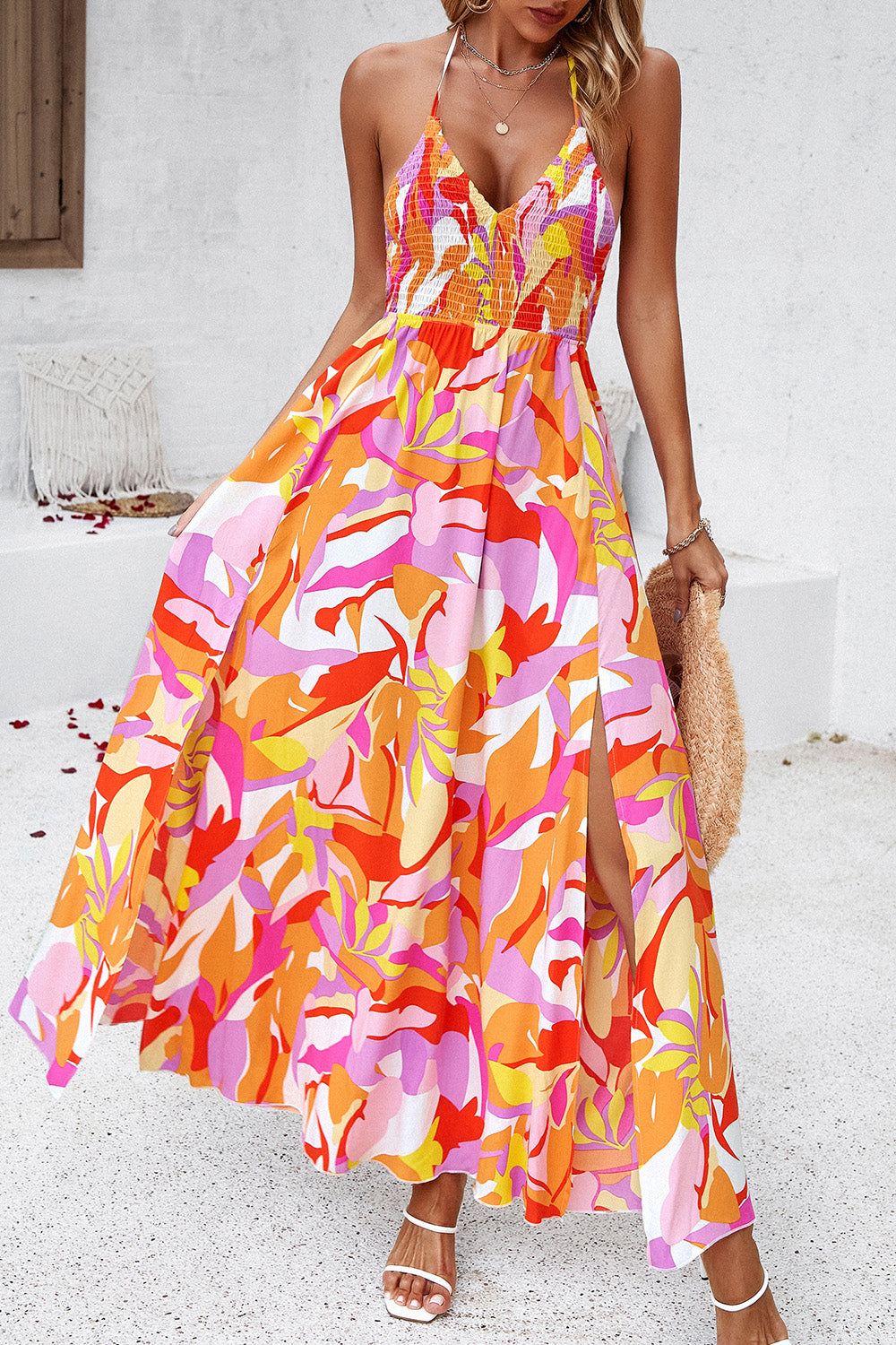 Indulge in feminine allure with our Smocked Slit Tied Printed Dress. Delicate smocked bodice, alluring front slit, and vibrant summer-inspired print make it perfect for any occasion. Shop now and embrace effortless femininity! Summer Dresses