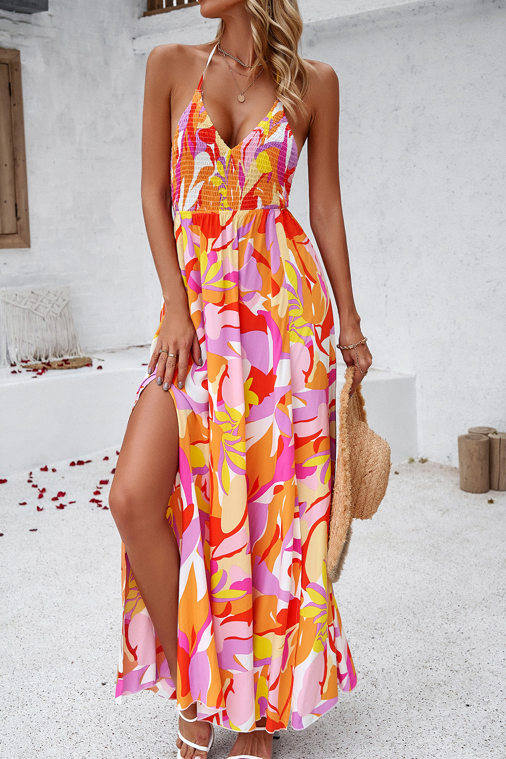 Indulge in feminine allure with our Smocked Slit Tied Printed Dress. Delicate smocked bodice, alluring front slit, and vibrant summer-inspired print make it perfect for any occasion. Shop now and embrace effortless femininity! Summer Dresses