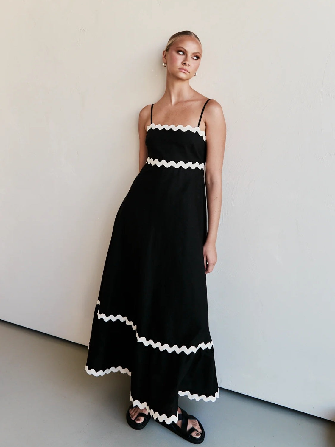 Discover chic summer style with our Spaghetti Strap Maxi Dress. Made from lightweight fabric for breathable comfort, this dress offers effortless elegance and flowy femininity. Perfect for any occasion, from beach days to brunch dates. Shop now for versatile summer style!