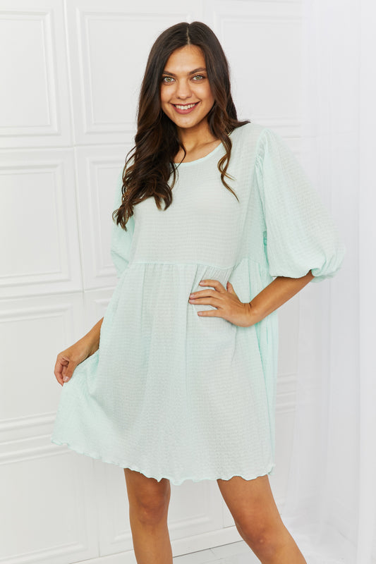 Puff Sleeve Elasticized Dress - A charming dress with playful puff sleeves and versatile styling options for both casual and dressy occasions.